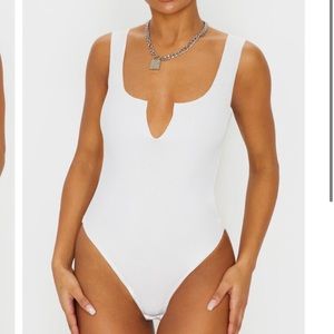 Pretty little thing Black V Sleeveless Bodysuit.